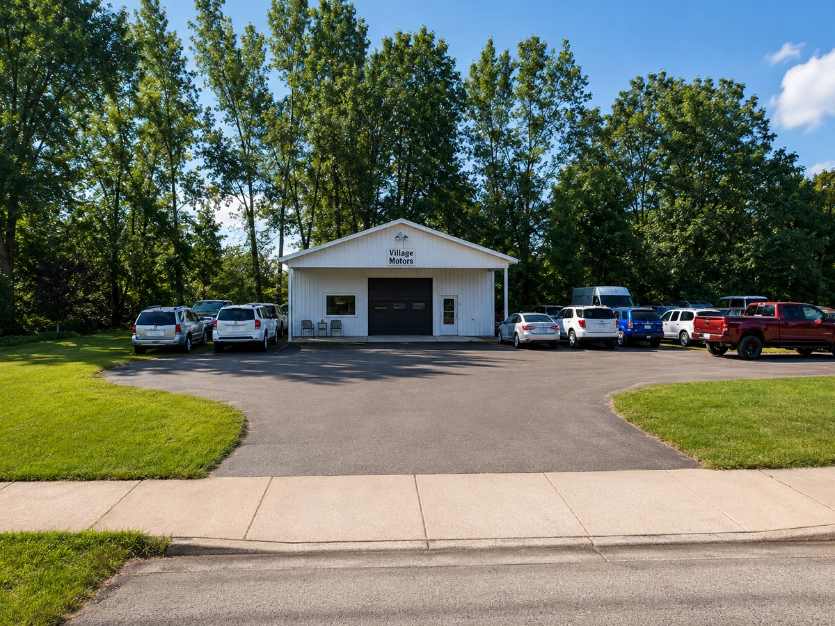 Village Motors dealership exterior and entrance